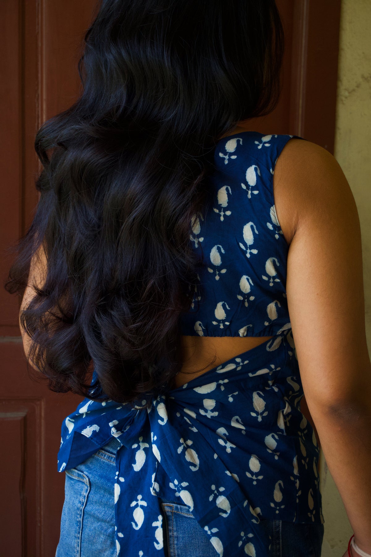 Esha - The Back Story | Indigo Bow Back Top
