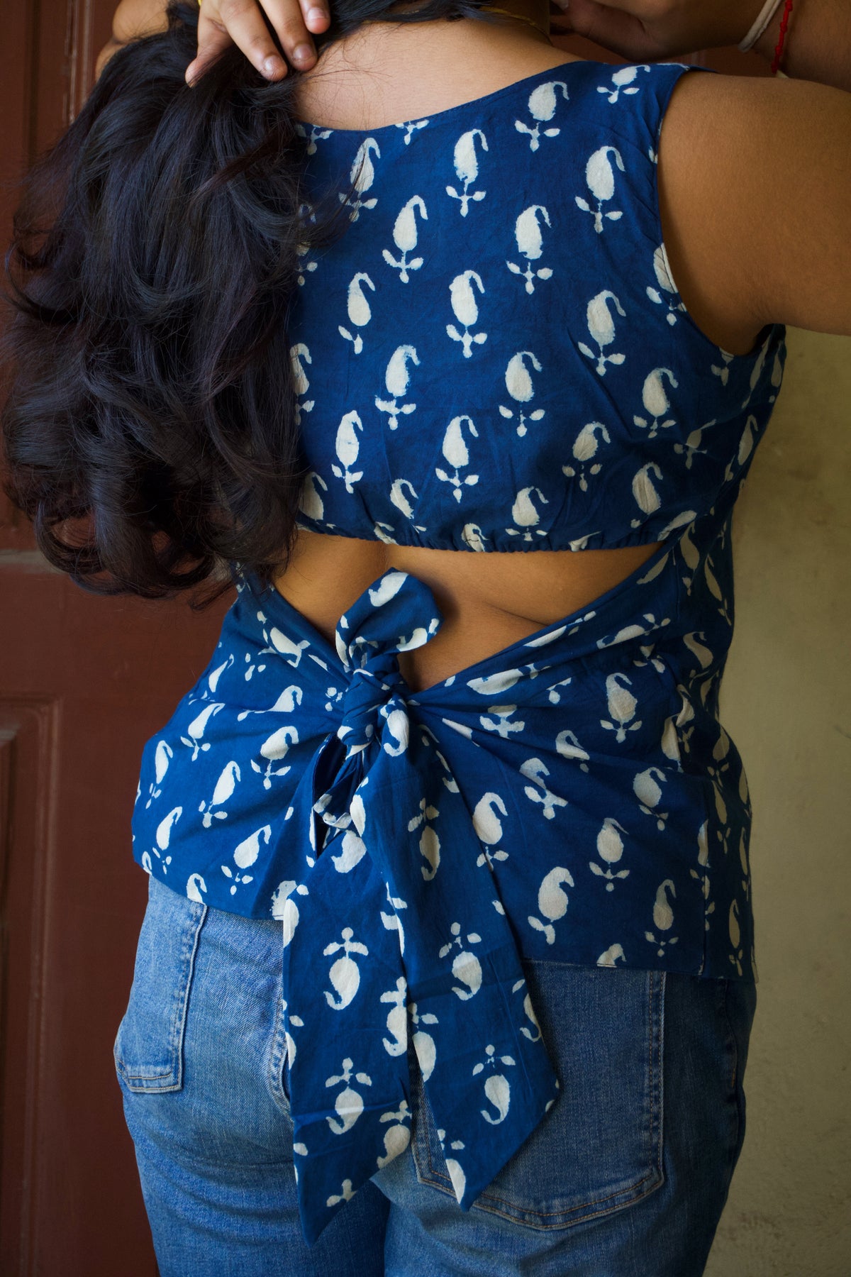 Esha - The Back Story | Indigo Bow Back Top