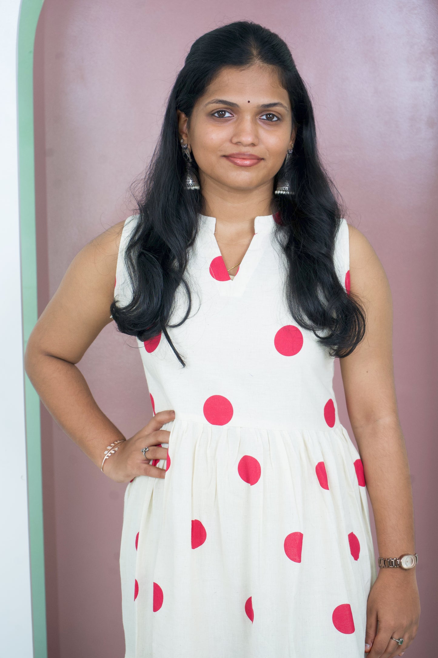 Sleeveless frock showcases with machine embroidery
