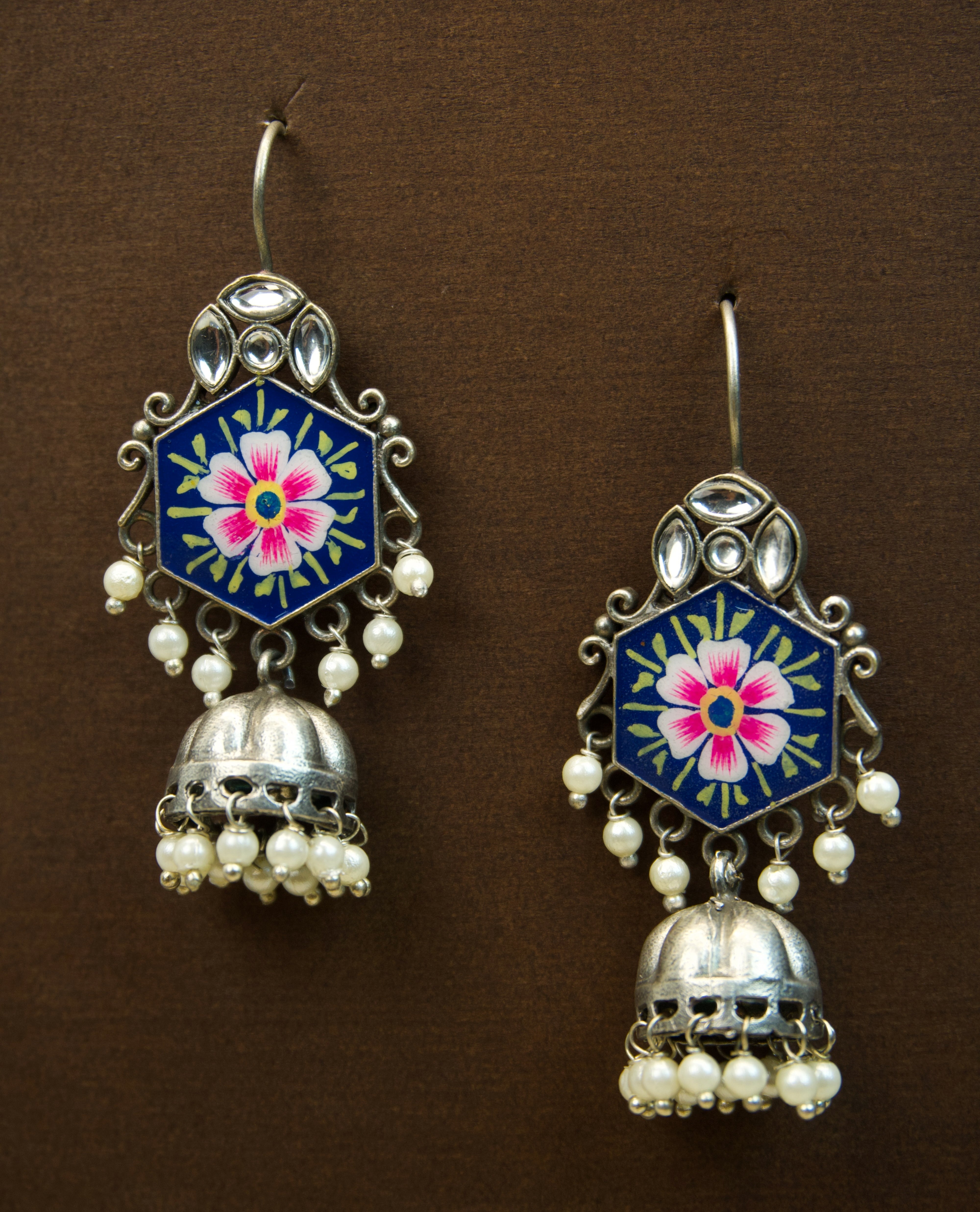 Pair of silver Oxidized earrings with pearl beads  in Brass metal Main image