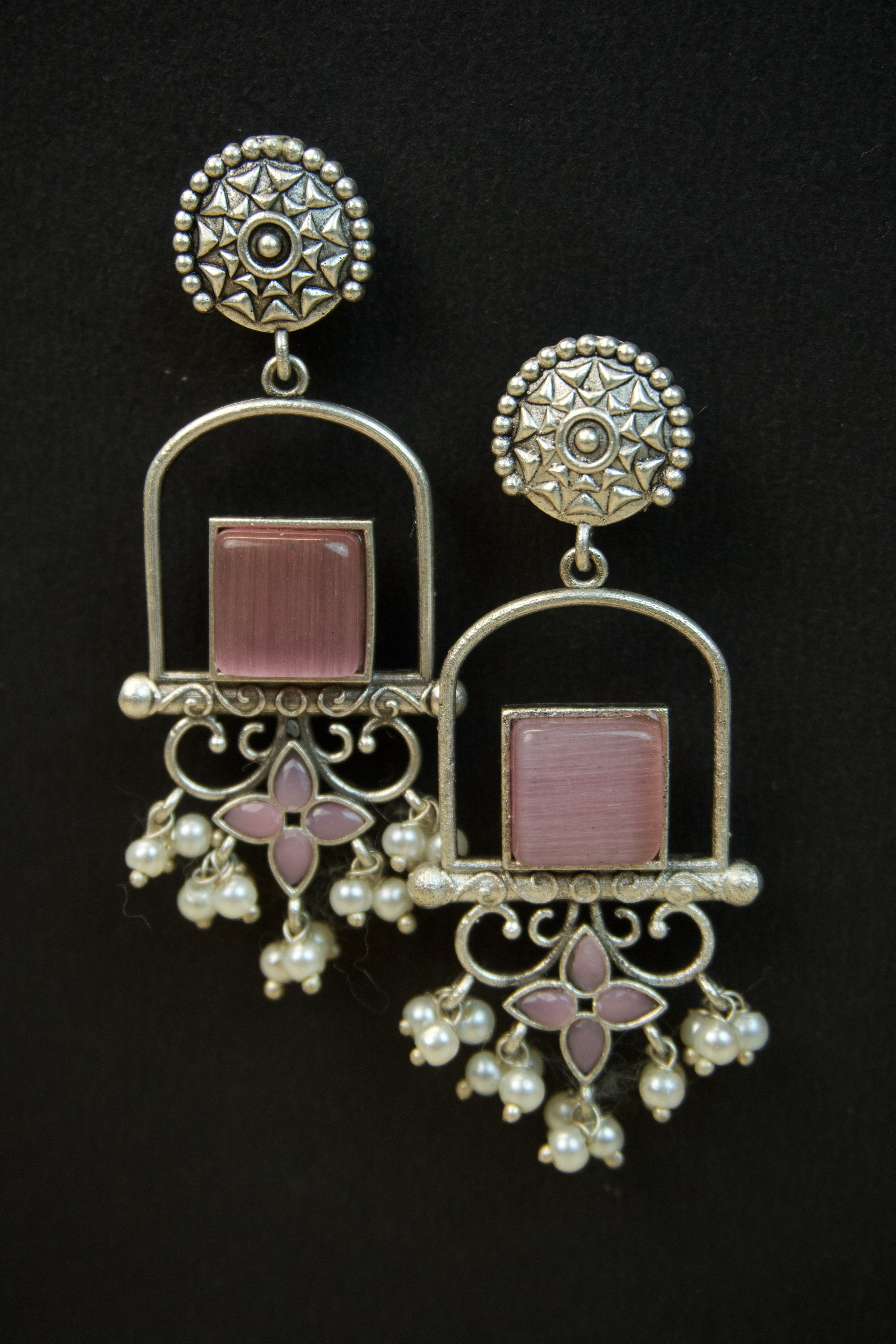 Pair of silver Oxidized earrings with pearl beads  in Brass metal