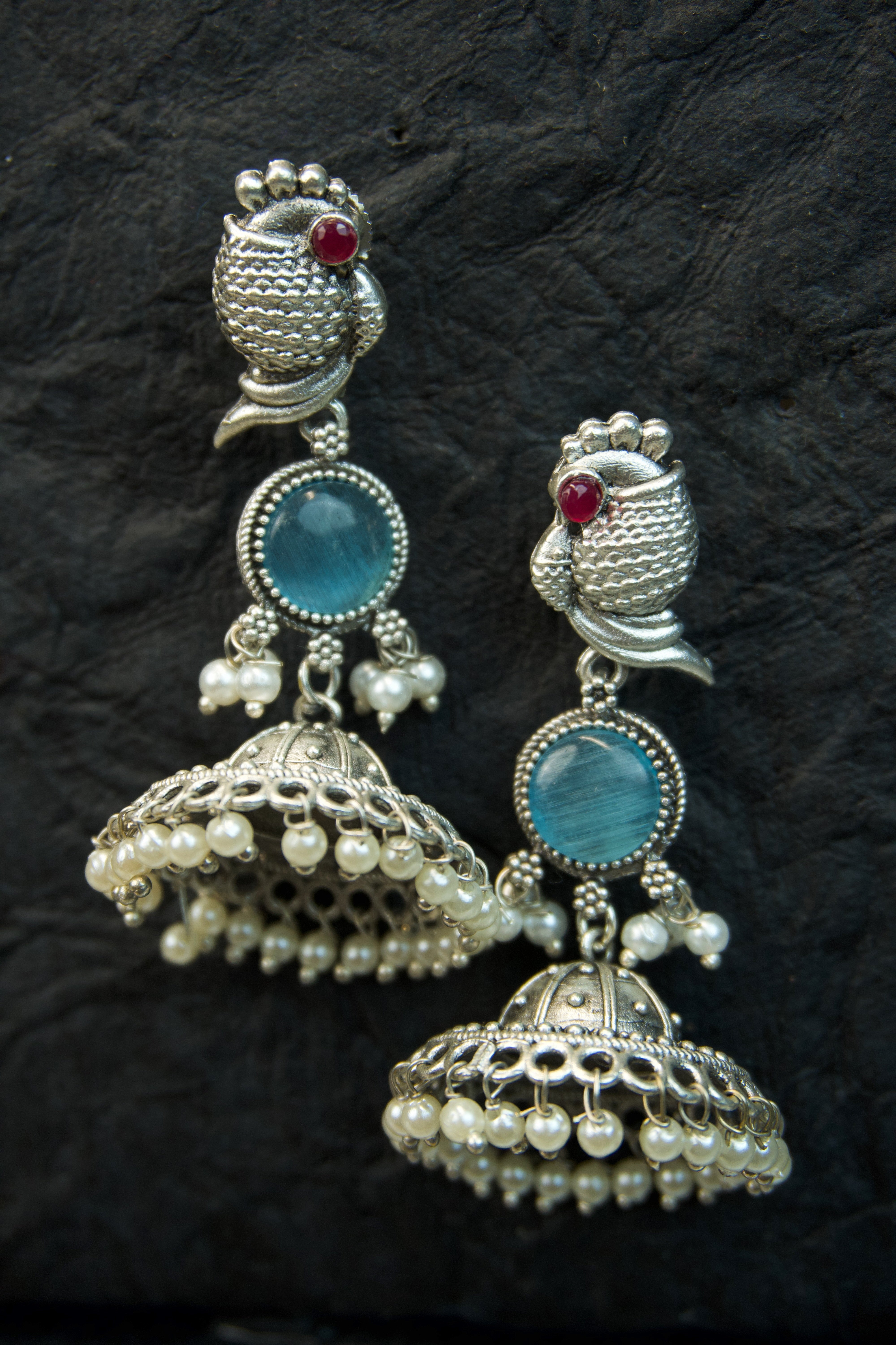 Pair of silver Oxidized earrings with pearl beads  in Brass metal Main image