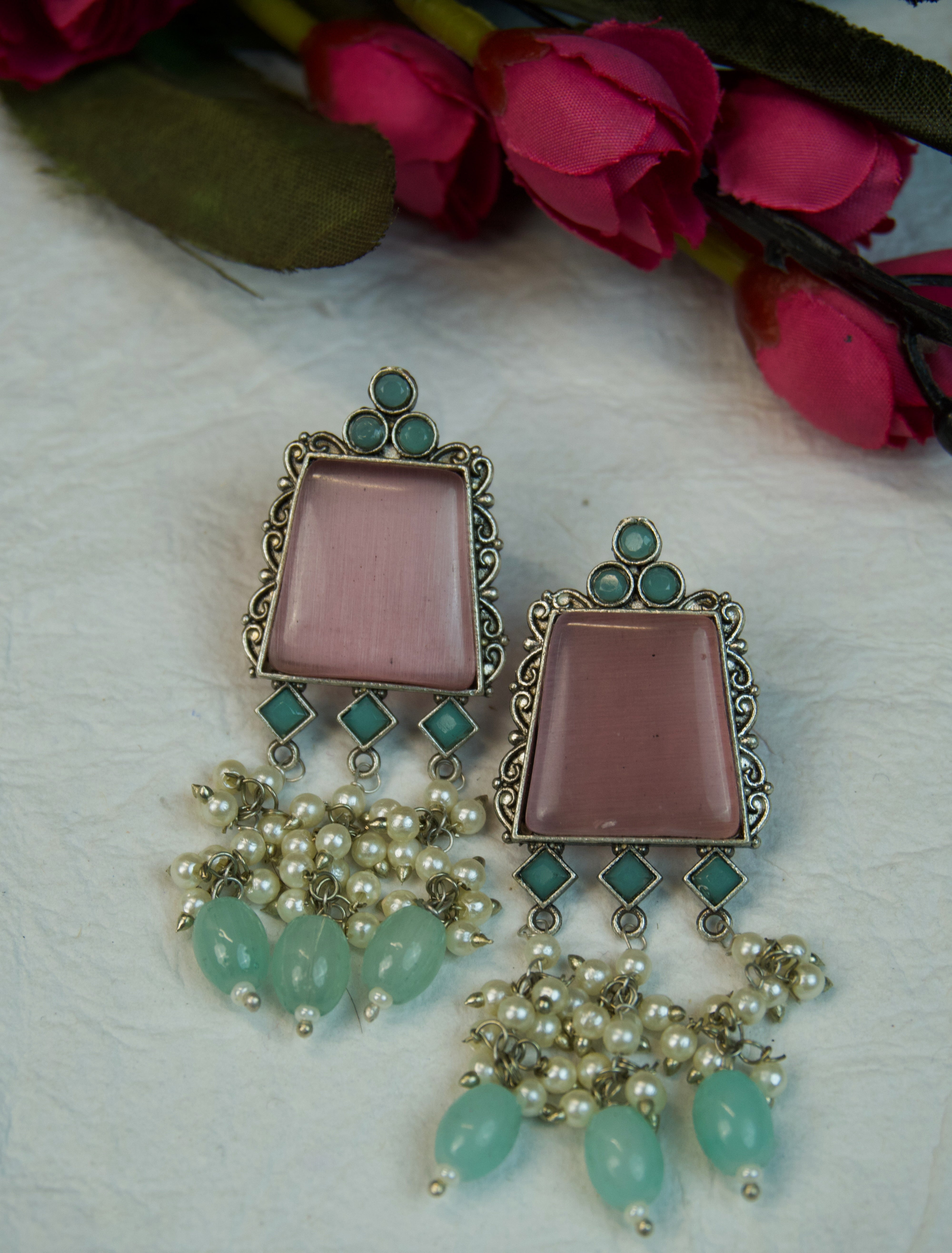 Pair of silver Oxidized earrings with pearl beads  in Brass metal Main image