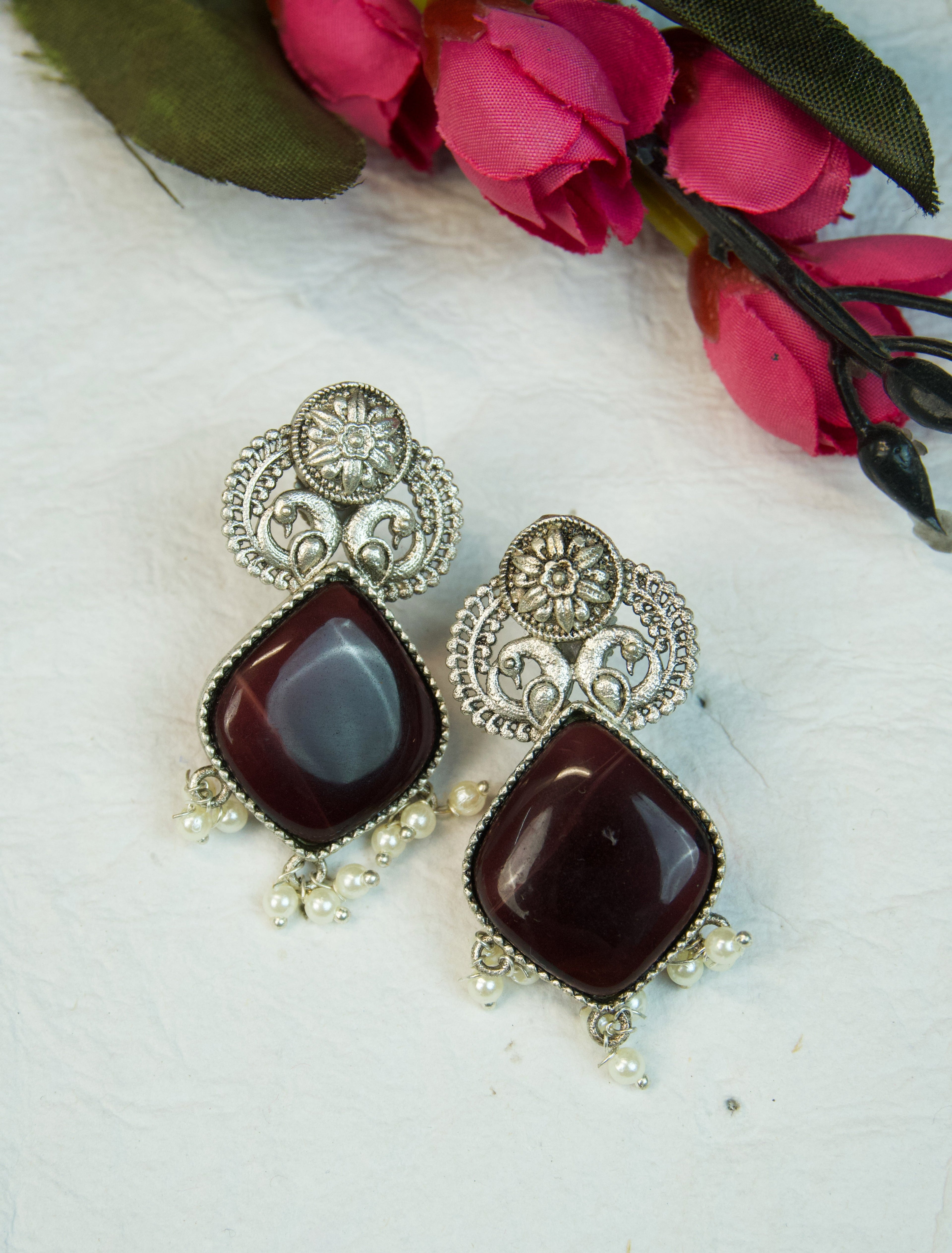 Pair of silver Oxidized earrings with pearl beads  in Brass metal